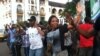 FILE - Dancers perform in a flashmob in downtown Freetown, Sierra Leone, Oct. 14, 2013. (Nina deVries for VOA)