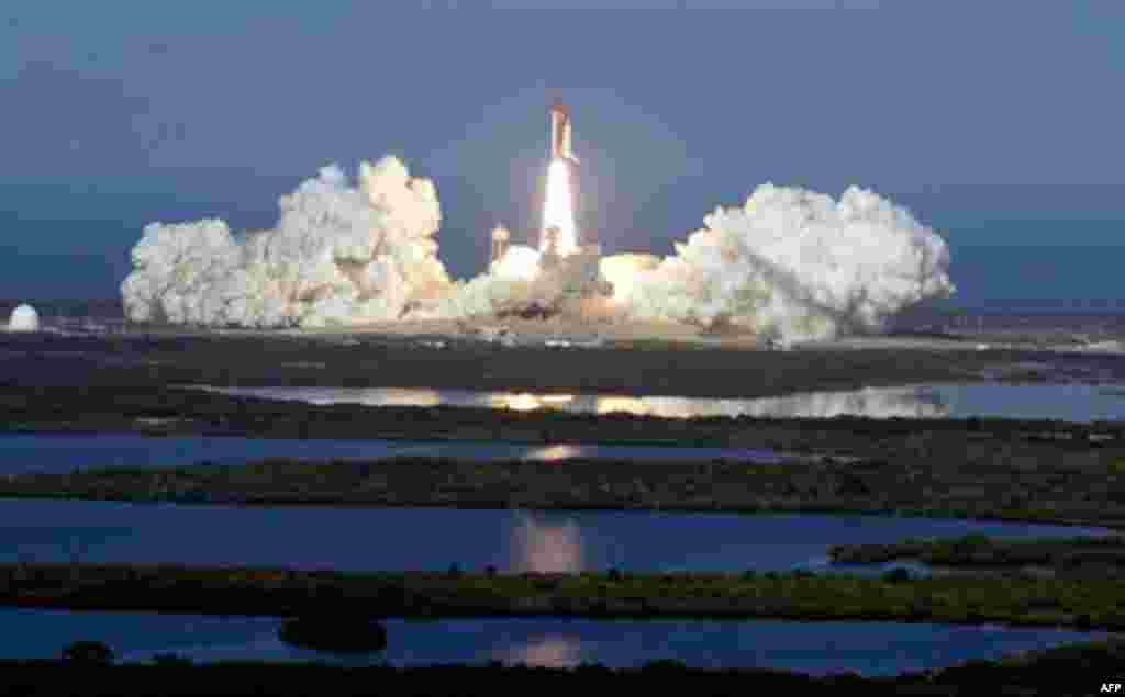 Space shuttle Discovery lifts off from the Kennedy Space Center in Cape Canaveral, Florida. Discovery, the world's most traveled spaceship, thundered into orbit for the final time Thursday, heading toward the International Space Station (AP/Chris O'Meara)