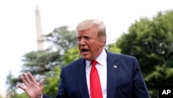 President Donald Trump speaks to reporters before boarding Marine One on the South Lawn of the White House in Washington, June 18, 2019.