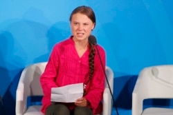 FILE - Environmental activist Greta Thunberg of Sweden addresses the Climate Action Summit in the U.N. General Assembly, at U.N. headquarters, Sept. 23, 2019.