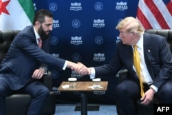 دۆناڵد ترامپ و ئەحمەد شەرع لە کۆبوونەوەی ڕۆژی 8ـی حەوتی 2026 لە ئەنقەرە.