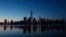 One World Trade Center in New York is reflected in the Hudson River as seen from Jersey City, New Jersey, May 10, 2013. 