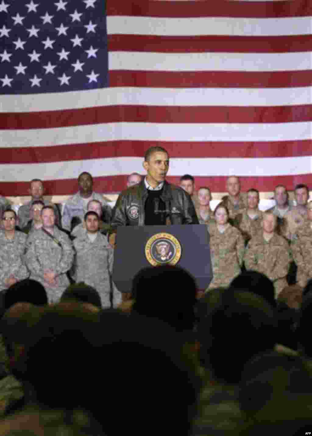 President Barack Obama speaks to troops at a rally during an unannounced visit at Bagram Air Field in Afghanistan, Friday, Dec. 3, 2010. (AP Photo/Pablo Martinez Monsivais)