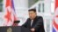 This picture taken on September 9, 2024 and released by North Korea's official Korean Central News Agency (KCNA) via KNS on September 10, 2024 shows North Korean leader Kim Jong Un delivering a speech on the 76th anniversary of the founding of the DPRK, a