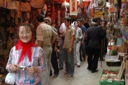 Chinese tourists visit an Iranian bazaar in this undated photo published by the Tehran Times newspaper in November 2019 (Credit: Tehran Times)