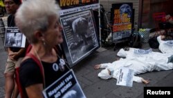 Anti-war demonstrators march and protest on Hiroshima anniversary, in New York