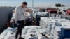 Trucks carrying humanitarian aid line up on the Egyptian side of the Rafah border crossing with the Gaza Strip, March 2, 2025, after Israel suspended the entry of supplies into the Palestinian enclave. 