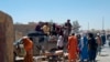 Taliban fighters patrol inside the city of Farah, capital of Farah province, southwest Afghanistan, Aug. 11, 2021. 