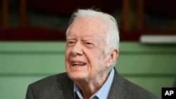 FILE - Former President Jimmy Carter teaches Sunday school at Maranatha Baptist Church, in Plains, Georgia, Nov. 3, 2019.