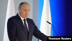 블라디미르 푸틴 러시아 대통령이 21일, 러시아 상하 합동회의에서 연례 국정연설을 하고 있다. 
