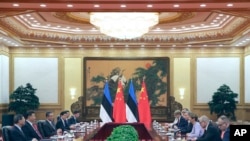 2018年9月18日，中國國家主席習近平(左二)在人民大會堂會見愛沙尼亞總統卡留萊德(右四)。
