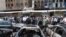 Burnt out cars at site of blast in Damascus June 28, 2012