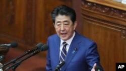 Japanese Prime Minister Shinzo Abe delivers a policy speech in Tokyo, Jan. 20, 2020.