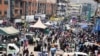 Jalan Namirembe yang ramai di Pusat Bisnis Pusat, setelah kementerian kesehatan mengumumkan wabah virus Ebola di ibu kota Uganda, Kampala, 30 Januari 2025. (REUTERS/Abubaker Lubowa)