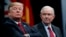 FILE - President Donald Trump sits with Attorney General Jeff Sessions during the FBI National Academy graduation ceremony in Quantico, Va., Dec. 15, 2017. 