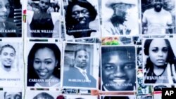 FILE - A makeshift memorial for Black lives lost to violence is seen in Portland, Oregon, Aug. 1, 2020.