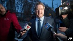 Joaquin Guzman's defense attorney Jeffrey Lichtman, speaks to reporters as he leaves Brooklyn Federal Court after opening arguments in the trial of the Mexican drug lord known as "El Chapo," Nov. 13, 2018, in New York.
