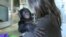 Filmmaker Irene Magafan with baby Teco, the newest addition to the Great Ape Trust in Des Moines, Iowa, in November 2011.(Courtesy Irene Magafan)