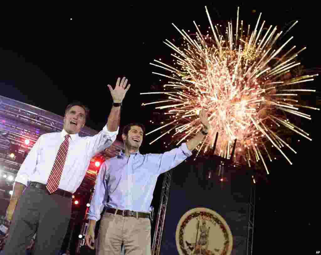 Republican presidential candidate and former Massachusetts Gov. Mitt Romney campaigns with vice presidential candidate Paul Ryan in Fishersville, Virginia, Oct. 4, 2012.