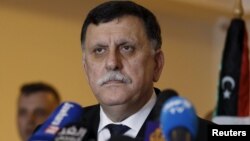 Perdana Menteri Tripoli Fayez Seraj, salah satu tokoh politik Libya yang akan menghadiri pembicaraan di Paris. 