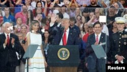 U.S. President Donald Trump, first lady Melania Trump, Vice President Mike Pence, Acting Secretary of Defense Mark Esper and Chairman of the Joint Chiefs of Staff General Joseph Dunford attend the "Salute to America" event in Washington, July 4, 2019. 