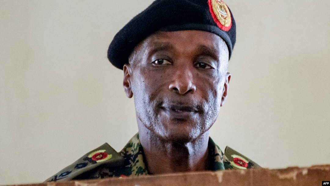 FILE - Uganda's former police chief Kale Kayihura appears at the military court in Kampala, Uganda, Aug. 24, 2018.