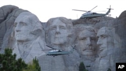 Marine One flies past Mount Rushmore National Memorial, near Keystone, S.D., July 3, 2020.