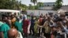 The body of a elderly woman is shown to the press at Kinshasa central morgue, on April 13, 2015, where the local governement organized a visit to highlight the need for mass graves after more than 420 bodies were discovered 100 km outside Kinshasa. 