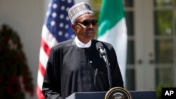 Nigerian President Muhammadu Buhari speaks during a news conference with President Donald Trump in the Rose Garden of the White House in Washington, April 30, 2018.