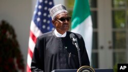 FILE - Nigerian President Muhammadu Buhari speaks during a news conference with President Donald Trump in the Rose Garden of the White House in Washington, April 30, 2018. Buhari on Wednesday formally submitted his candidacy to stand for a second term of office at elections in February next year.