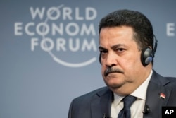 FILE-Iraq's Prime Minister Mohammed Shia al-Sudani attends the annual meeting of the World Economic Forum in Davos, Switzerland, January 18, 2024.
