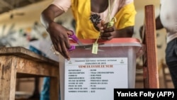 Vote à Cotonou, Benin, le 28 avril 2019.