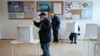 A man casts his ballot during presidential elections, at a polling station in Zagreb, Croatia, Dec. 29, 2024.