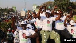 Supporters of Edgar Lungu, leader of the Patriotic Front, celebrate after Lungu narrowly won re-election, in a vote that rival Hakainde Hichilema rejected on claims of alleged rigging by the electoral commission, in Lusaka, Zambia, Aug. 15, 2016.