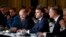 French President Emmanuel Macron, center, delivers a speech at the Elysee Palace in Paris, Feb. 26, 2024. More than 20 European heads of state and government and other Western officials are gathering in a show of unity for Ukraine. 