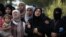 Syrian women mourn the loss of loved ones in Aleppo fighting, August 5, 2012. 