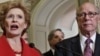 Senate Agriculture Committee members, led by Sen. Debbie Stabenow, D-Mich., center, praise bipartisan passage of the Farm Bill, Washington, June 21, 2012.