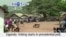 VOA60 Africa - Uganda: Voting starts in presidential poll