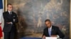 اوباما دفتر یادبود قربانیان حمله به شارلی ابدو را امضا کرد