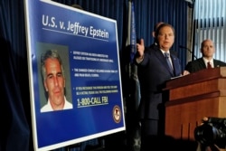 FILE - United States Attorney for the Southern District of New York Geoffrey Berman speaks during a news conference, in New York, July 8, 2019.