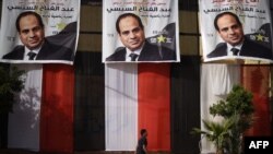 Des affiches de Sissi, dans le quartier de Giza, au Caire, le 25 mars 2018.