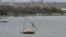 A traditional felucca sailing boat transits the Nile river in Cairo, Egypt, January 22, 2013.