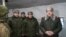 FILE: Belarus President Alexander Lukashenko, right, with military top officials at Obuz-Lesnovsky , Belarus, Friday, Jan. 6, 2023. Belarusian Defense Minister Viktor Khrenin is cenere, and the State Secretary of the Security Council Alexander Volfovich is second left.