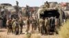 Israeli tanks head towards the Gaza Strip border in southern Israel on Thursday, Oct.12, 2023. 