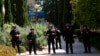 FILE - Police on the UCLA campus after nighttime clashes between pro-Israel and pro-Palestinian groups, May 1, 2024, in Los Angeles. 