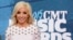 FILE - Ashley Monroe arrives at the CMT Music Awards in Nashville, Tennessee, June 10, 2015. 