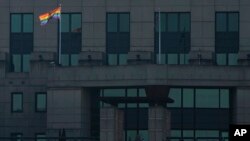 The MI6 Vauxhall Cross building raises the Rainbow Flag to mark its support for the International Day Against Homophobia, Transphobia and Biphobia in London, Britain, May 17, 2016. 