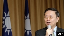 Wang Yu-chi, minister of Taiwan's Mainland Affairs Council, speaks during a press conference in Taipei, Jan. 28, 2014.