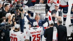 Washington Capitals team owner Ted Leonsis hoists the Stanley Cup after after the Capitals defeated the Golden Knights 4-3 in Game 5 of the NHL hockey Stanley Cup Finals, June 7, 2018, in Las Vegas.