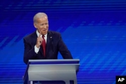 FILE - Former Vice President Joe Biden responds to a question during a Democratic presidential primary debate hosted by ABC at Texas Southern University in Houston, Sept. 12, 2019.